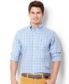The simplicity of plaid style doesn't go unnoticed with this classic preppy shirt from Nautica.