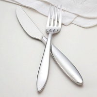 Contemporary design, graceful and curvaceous, this pattern seamlessly complements both modern and traditional table settings. Includes eight 5-piece place settings and 5 serving pieces - tablespoon, pierced tablespoon, cold meat fork, sugar spoon and butter knife. Contemporary design, graceful and curvaceous, this pattern seamlessly complements both modern and traditional table settings. Includes eight 5-piece place settings and 5 serving pieces - tablespoon, pierced tablespoon, cold meat fork, sugar spoon and butter knife.