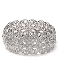 A striking take on shape and shimmer, Lora Paolo's woven bangle is a sophisticated soirée choice. The bold bauble is revel ready with a refined frock and classic pumps. A striking take on shape and shimmer, Lora Paolo's woven bangle is a sophisticated soirée choice. The bold bauble is revel ready with a refined frock and classic pumps.