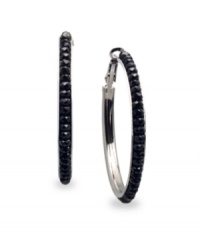 Looking for a little drama? Stir it up in these non-traditional hoop earrings from c.A.K.e. by Ali Khan. Crafted in hematite tone mixed metal, hoops feature jet black glass beads for edgy appeal. Approximate diameter: 1-5/8 inches. Looking for a little drama? Stir it up in these non-traditional hoop earrings from c.A.K.e. by Ali Khan. Crafted in hematite tone mixed metal, hoops feature jet black glass beads for edgy appeal. Approximate diameter: 1-5/8 inches.