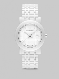 A sleek design with a white check etched dial. Quartz movement Water resistant to 5 ATM Round ion-plated stainless steel case, 34mm (1.3) Smooth bezel White dial Bar hour markers Date display at 3 o'clock Second hand Ceramic check link bracelet, 18mm wide (0.7) Made in Switzerland A sleek design with a white check etched dial. Quartz movement Water resistant to 5 ATM Round ion-plated stainless steel case, 34mm (1.3) Smooth bezel White dial Bar hour markers Date display at 3 o'clock Second hand Ceramic check link bracelet, 18mm wide (0.7) Made in Switzerland