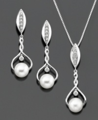 Awe-inspiring design, perfect for a truly elegant look. This pendant and earrings set features round-cut diamond (1/10 ct. t.w.) and cultured freshwater pearl (6.5-7 mm) set in sterling silver. Pendant measures approximately 18 inches with a 1-1/4 inch drop. Earrings measure approximately 1-1/4 inches.