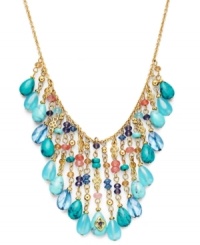 Splash your neckline with summery hues. Lauren by Ralph Lauren's perfects any warm-weather ensemble with semi-precious reconstituted turquoise and coral-hued glass accents. Set in gold tone mixed metal with a lobster claw closure. Approximate length: 16 inches + 2-inch extender. Approximate drop: 3/4 inch to 2-1/4 inches. Splash your neckline with summery hues. Lauren by Ralph Lauren's perfects any warm-weather ensemble with semi-precious reconstituted turquoise and coral-hued glass accents. Set in gold tone mixed metal with a lobster claw closure. Approximate length: 16 inches + 2-inch extender. Approximate drop: 3/4 inch to 2-1/4 inches.