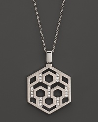 An eye-catching geometric pattern and brilliant diamonds distinguish this sterling silver pendant from India Hicks. An eye-catching geometric pattern and brilliant diamonds distinguish this sterling silver pendant from India Hicks.