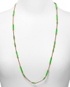 Chic colored enamel breaks up this long and lovely gold-tone chain necklace from kate spade new york. Wear it as a single strand or layered among others for a effortless, self-styled look.