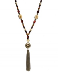 Lauren Ralph Lauren's lovely necklace features a trendy tassel design with semi-precious tiger's eye beads and glass, resin and wood accents. Approximate length: 32 inches + 2-inch extender. Approximate drop: 5-1/2 inches. Lauren Ralph Lauren's lovely necklace features a trendy tassel design with semi-precious tiger's eye beads and glass, resin and wood accents. Approximate length: 32 inches + 2-inch extender. Approximate drop: 5-1/2 inches.