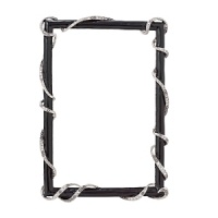 This black hand-enameled frame is adorned with an eye-catching silver-tone ribbon of clear pave Swarovski® crystals. This black hand-enameled frame is adorned with an eye-catching silver-tone ribbon of clear pave Swarovski® crystals.