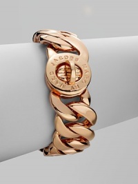 A logo engraved, chain link design. Brass Turnlock closure Length, about 8 Width, about ¾ Imported A logo engraved, chain link design. Brass Turnlock closure Length, about 8 Width, about ¾ Imported