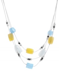 Sweeten your style with candy colors. Kenneth Cole New York's delicate illusion necklace features semi-precious blue quartz, green amazonite and yellow jade geometric stones with small hematite and silver beaded details. Set in mixed metal. Approximate length: 16 inches + 3-inch extender. Approximate drop: 1-3/4 inches.