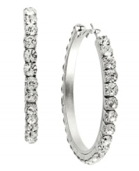 Hoops that pair effortlessly with your favorite blue jeans or your best cocktail dress. INC International Concepts' sparkling style incorporates round-cut crystals in a large silver tone mixed metal setting. Approximate diameter: 2 inches. Hoops that pair effortlessly with your favorite blue jeans or your best cocktail dress. INC International Concepts' sparkling style incorporates round-cut crystals in a large silver tone mixed metal setting. Approximate diameter: 2 inches.