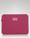 Ensure your computer is pretty (and protected) with this neoprene laptop case from MARC BY MARC JACOBS.