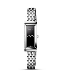 From the G-Frame collection, this sleek watch from Gucci is centered on an elongated rectangle display with minimalist black lacquered dial with diamond accent. From the G-Frame collection, this sleek watch from Gucci is centered on an elongated rectangle display with minimalist black lacquered dial with diamond accent.