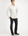 A slim-fit cotton style with a narrow point collar and cuffs.Button frontLong sleevesCottonDry cleanImported