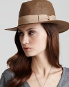 Keep your cool in a woven flat brim hat with bow and black ribbon trim.