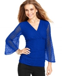 Style&co.'s elegant petite top is perfect to wear to work or for a night out! Textured fabric and fun sheer sleeves create a versatile look for all times of the day. Style&co.'s elegant petite top is perfect to wear to work or for a night out! Textured fabric and fun sheer sleeves create a versatile look for all times of the day.