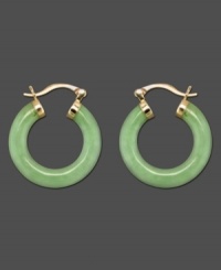 Go for a smooth and calming look with these beautiful jade hoop earrings set in 14k gold. Approximate diameter: 1 inch.