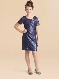 She'll shine like a disco ball in this slim-fitting, sequined shift dress.ScoopneckShort sleevesConcealed back zipperFully linedNylon/polyester/spandexDry cleanMade in the USA She'll shine like a disco ball in this slim-fitting, sequined shift dress.ScoopneckShort sleevesConcealed back zipperFully linedNylon/polyester/spandexDry cleanMade in the USA