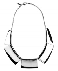 Status symbol. This not-so-subtle style will get you recognized fast. Shiny geometric pieces make up Nine West's chic collar necklace. Crafted in silver tone mixed metal. Approximate length: 16 inches + 2-inch extender. Approximate drop: 1 inch. Status symbol. This not-so-subtle style will get you recognized fast. Shiny geometric pieces make up Nine West's chic collar necklace. Crafted in silver tone mixed metal. Approximate length: 16 inches + 2-inch extender. Approximate drop: 1 inch.