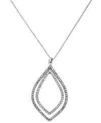 Pretty sparkly pendants. Fossil's mixed metal necklace is silver toned with clear pave crystals. It features a sparkling layered orbital pendant and a lobster claw closure. Approximate length: 22 inches + 2-inch extender. Approximate drop: 2-1/10 inches. Pretty sparkly pendants. Fossil's mixed metal necklace is silver toned with clear pave crystals. It features a sparkling layered orbital pendant and a lobster claw closure. Approximate length: 22 inches + 2-inch extender. Approximate drop: 2-1/10 inches.