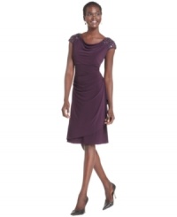 Alex Evenings' dress dazzles with beaded cap sleeves and a figure-flattering silhouette. Alex Evenings' dress dazzles with beaded cap sleeves and a figure-flattering silhouette.