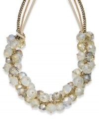 Add effervescent style with this bubbly necklace. This c.A.K.e. by Ali Khan design features opal-tone glass beads strung from a gold tone mixed metal chain. Approximate length: 18 inches + 3-inch extender. Approximate drop: 1 inch. Add effervescent style with this bubbly necklace. This c.A.K.e. by Ali Khan design features opal-tone glass beads strung from a gold tone mixed metal chain. Approximate length: 18 inches + 3-inch extender. Approximate drop: 1 inch.
