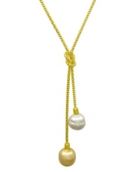 From the island of Mallorca, Spain, this love knot lariat pendant features white and champagne organic man-made baroque pearls (14 mm) set in 18k gold over sterling silver. Approximate length: 16-18 inches. Approximate drop: 1 inch. From the island of Mallorca, Spain, this love knot lariat pendant features white and champagne organic man-made baroque pearls (14 mm) set in 18k gold over sterling silver. Approximate length: 16-18 inches. Approximate drop: 1 inch.