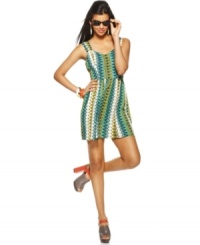 An allover brightly bold geometric print lends standout style to this Bar III dress -- an open back with bow-tie detail adds eye-catching appeal! An allover brightly bold geometric print lends standout style to this Bar III dress -- an open back with bow-tie detail adds eye-catching appeal!