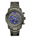 Bright blue electrifies this monochromatic chronograph watch by GUESS.