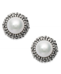 Dedicated to elegance. These beautiful cultured freshwater pearl earrings (8-1/2-9 mm) sit in an intricately-engraved sterling silver setting. Approximate diameter: 6/8 inch. Dedicated to elegance. These beautiful cultured freshwater pearl earrings (8-1/2-9 mm) sit in an intricately-engraved sterling silver setting. Approximate diameter: 6/8 inch.