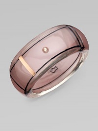 This glossy resin style features an illusion design with metal accents. ResinRose goldtone brassDiameter, about 2.3Slip-on styleImported This glossy resin style features an illusion design with metal accents. ResinRose goldtone brassDiameter, about 2.3Slip-on styleImported