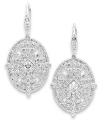 Decidedly dazzling! Eliot Danori's leverback drop earrings glisten and gleam with crystals and cubic zirconias (1 ct. t.w.). Set in silver tone mixed metal, they'll add an eye-catching element to your look for day or evening. Approximate drop: 1 inch.