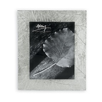 Michael Aram finds inspiration from nature for many of his handcrafted metalware pieces. The Forest Leaf frames are in tarnish resistant silverplate. Michael Aram finds inspiration from nature for many of his handcrafted metalware pieces. The Forest Leaf frames are in tarnish resistant silverplate.