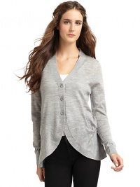THE LOOKButton closureDual seam pocketsGently ruffled hemTHE FITAbout 27 from shoulder to hemTHE MATERIALWoolCARE & ORIGINDry cleanImportedModel shown is 5'8 (172½cm) wearing US size Small. THE LOOKButton closureDual seam pocketsGently ruffled hemTHE FITAbout 27 from shoulder to hemTHE MATERIALWoolCARE & ORIGINDry cleanImportedModel shown is 5'8 (172½cm) wearing US size Small.