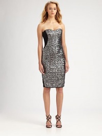 Panels of dazzling sequins decorate this strapless, form-fitting style.Strapless sweetheart necklineSequined embroideryBack ventConcealed back zipFully linedAbout 19 from natural waistSilkDry cleanImportedModel shown is 5'11 (180cm) wearing US size 4.This style runs true to size. We recommend ordering your usual size for a standard fit. Panels of dazzling sequins decorate this strapless, form-fitting style.Strapless sweetheart necklineSequined embroideryBack ventConcealed back zipFully linedAbout 19 from natural waistSilkDry cleanImportedModel shown is 5'11 (180cm) wearing US size 4.This style runs true to size. We recommend ordering your usual size for a standard fit.
