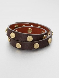 This coated saffiano leather design features a row of logo studs. Coated saffiano leatherGoldtoneLength, about 15.75Snap button closureImported This coated saffiano leather design features a row of logo studs. Coated saffiano leatherGoldtoneLength, about 15.75Snap button closureImported