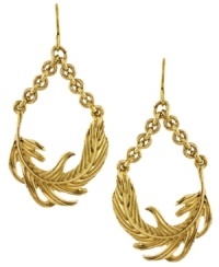 Blowing in the wind. Delicate sideways leaf charms hang from chunky chains in BCBGeneration's breezy hoop earrings. Crafted in gold tone mixed metal. Approximate drop: 2 inches. Blowing in the wind. Delicate sideways leaf charms hang from chunky chains in BCBGeneration's breezy hoop earrings. Crafted in gold tone mixed metal. Approximate drop: 2 inches.