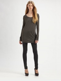 Long, slouchy fit gives this supremely soft tee a dose of menswear-inspired appeal. RoundneckDropped shouldersLong sleevesLonger length hits below the hipsRayonMachine washImportedModel shown is 5'10 (177cm) wearing US size Small. Long, slouchy fit gives this supremely soft tee a dose of menswear-inspired appeal. RoundneckDropped shouldersLong sleevesLonger length hits below the hipsRayonMachine washImportedModel shown is 5'10 (177cm) wearing US size Small.