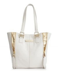 A timeless tote from Calvin Klein. Accented with polished goldtone hardware and modern vertical front zip pockets, this posh design will keep your style chic for seasons to come. A timeless tote from Calvin Klein. Accented with polished goldtone hardware and modern vertical front zip pockets, this posh design will keep your style chic for seasons to come.