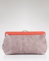 The color block trend goes compact with this snake-embossed clutch from Botkier. Tucked under a little white dress, this bag is ready to dance 'til dawn.