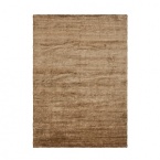 Inspired by the luster of European velvet, artisans create this Ralph Lauren rug's rich heathered texture by blending long threads of different hand-spun yarns--a technique known as abrash.Available in five spice hued colorways.