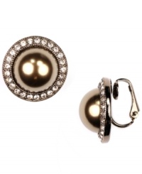 Darling studs for non-pierced ears. Givenchy's sparkling style features blush-colored glass pearls surrounded by sparkling glass accents. Approximate diameter: 3/4 inch. Darling studs for non-pierced ears. Givenchy's sparkling style features blush-colored glass pearls surrounded by sparkling glass accents. Approximate diameter: 3/4 inch.