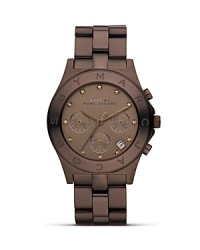 Chocolate brown watches are what's next, so this plated piece from MARC BY MARC JACOBS is ahead of the curve. Topaz stations makes this dipped delight extra indulgent. Chocolate brown watches are what's next, so this plated piece from MARC BY MARC JACOBS is ahead of the curve. Topaz stations makes this dipped delight extra indulgent.