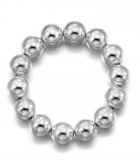 An opulent and alluring bracelet fit for any occasion. In silvertone mixed metal. Measures approximately 7 inches long. An opulent and alluring bracelet fit for any occasion. In silvertone mixed metal. Measures approximately 7 inches long.