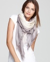 Wrap up in chic ombré with Tory Burch's dip-dyed logo jacquard scarf in a luxe silk and cotton blend.