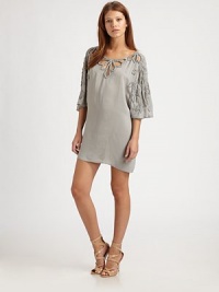 Delicate cut-outs and hand-beaded sequins define this effortless viscose shift.BoatneckDropped shouldersDolman sleevesAbout 31 from shoulder to hemViscoseDry cleanImportedModel shown is 5'10 (177cm) wearing US size Small. Delicate cut-outs and hand-beaded sequins define this effortless viscose shift.BoatneckDropped shouldersDolman sleevesAbout 31 from shoulder to hemViscoseDry cleanImportedModel shown is 5'10 (177cm) wearing US size Small.