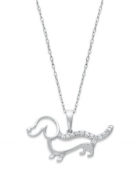 Pay tribute to your favorite long and loyal friend. This sparkling pendant features a cut-out dachshund decorated by round-cut diamonds (1/10 ct. t.w.). Set in sterling silver with a rhodium-plated chain. Approximate length: 18 inches. Approximate drop length: 3/5 inch. Approximate drop width: 1 inch. Pay tribute to your favorite long and loyal friend. This sparkling pendant features a cut-out dachshund decorated by round-cut diamonds (1/10 ct. t.w.). Set in sterling silver with a rhodium-plated chain. Approximate length: 18 inches. Approximate drop length: 3/5 inch. Approximate drop width: 1 inch.