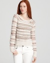 Burnout treatment is sheer and smart on this BCBGMAXAZRIA stripe sweater, a trend-right update to your layering collection and refined over a nude cami with crisp white jeans.