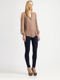 Cutout shoulders and a Mandarin collar revive this traditional silk shirt. Mandarin collarButton frontCutout shouldersLong bishop sleeves with buttoned cuffsLonger length hits below the hipsSilkDry cleanImportedModel shown is 5'11 (178cm) wearing US size Small. Cutout shoulders and a Mandarin collar revive this traditional silk shirt. Mandarin collarButton frontCutout shouldersLong bishop sleeves with buttoned cuffsLonger length hits below the hipsSilkDry cleanImportedModel shown is 5'11 (178cm) wearing US size Small.