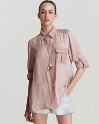 Elevate off-duty styles with a touch of femininity. This MARC BY MARC JACOBS button-down shirt is the natural choice when softness is a must and a tee just won't do. Elevate off-duty styles with a touch of femininity. This MARC BY MARC JACOBS button-down shirt is the natural choice when softness is a must and a tee just won't do.