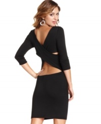 Designed with an alluring, crisscross back design, this little black dress from Sugar & Spice captivates with its sophisticated style. Designed with an alluring, crisscross back design, this little black dress from Sugar & Spice captivates with its sophisticated style.